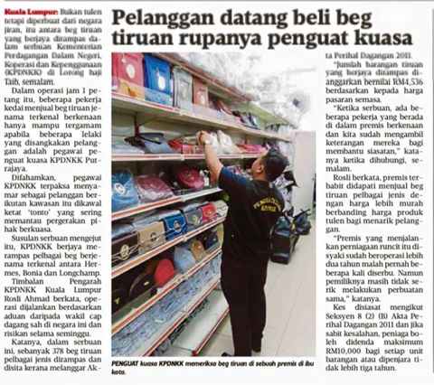 Pelanggan beli beg tiruan rupanya penguat kuasa